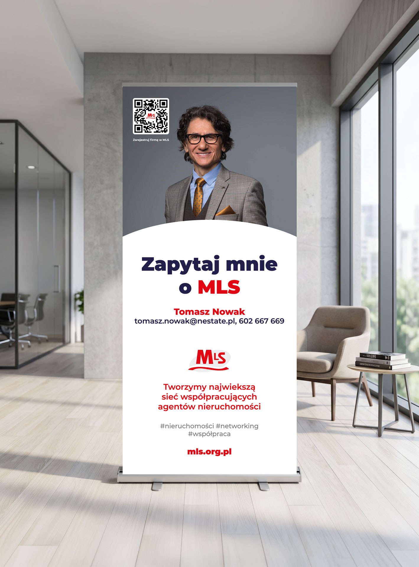 Mockup of a large MLS roll up banner in a modern lobby with the headline “Ask me about MLS” and a portrait of a suited ma